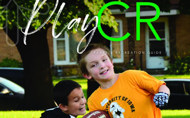 Photo from cover of Fall Play guide with two boys playing flag football